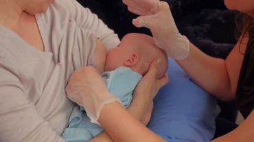 How to Feed your Baby: Cross Cradle Position
