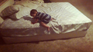 Smart Baby Throws Pillows on Floor to Climb Off Bed