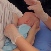 How to Feed your Baby: Cross Cradle Position